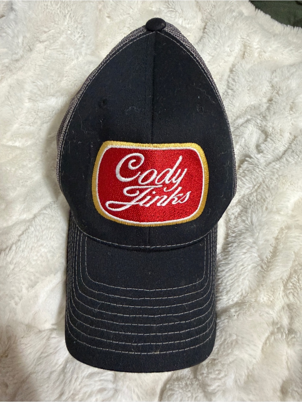 Black Trucker Hat with Red Patch